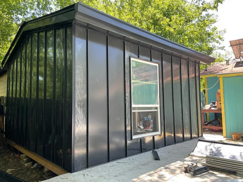 Black standing seam metal wall panels for Roof Inspection in Lewiston